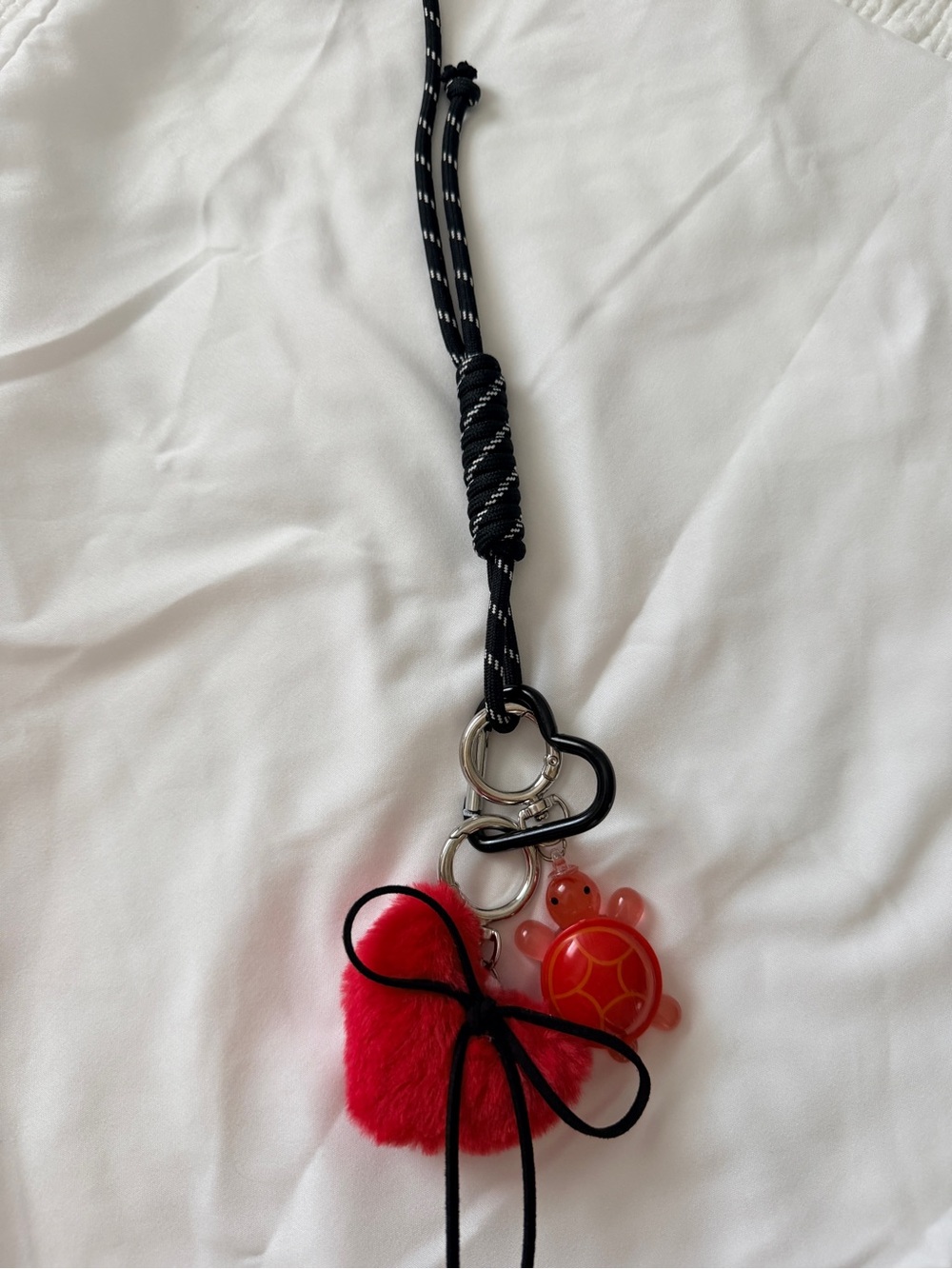 Urban Outfitters Black and Red Fuzzy Pom Keychain with Turtle Charm